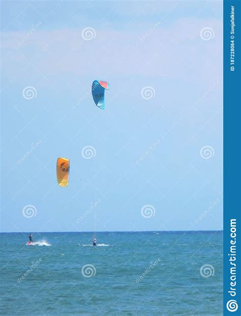 Tourists And Kite Surfers On Trafalgar Beach Spain Editorial Image