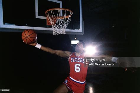 Julius Erving of the Philadelphia 76ers goes up for a slam dunk in ...