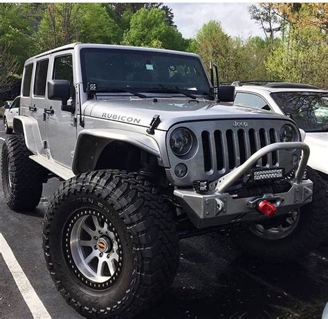 Silver Jeep With A Great Lift Wheels And Tires Silver Jeep Dream Cars