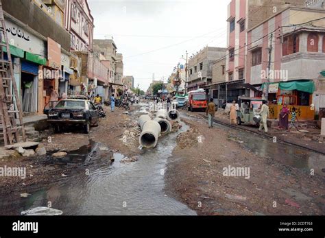 View Of Inundated Road By Garbage And Sewerage Water After Overflow Of