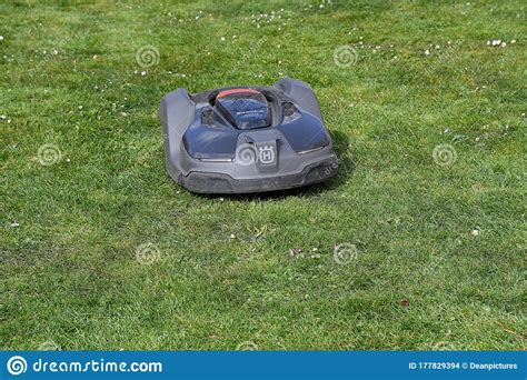 Hsuqvarba Electric Robot Grass Cutter Is Cutting Grass Editorial Stock Image Image Of Park