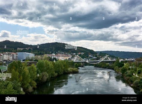 Cityscape With View Of The Millenium Bridge On The Minho River Seen