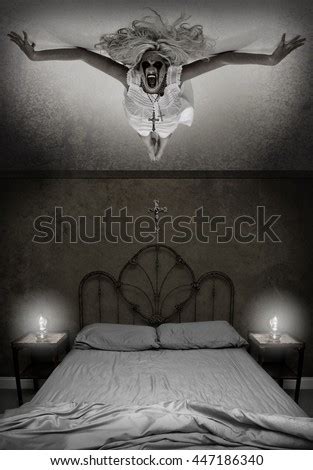 Possessed Woman Screaming Holding Creepy Doll Stock Photo