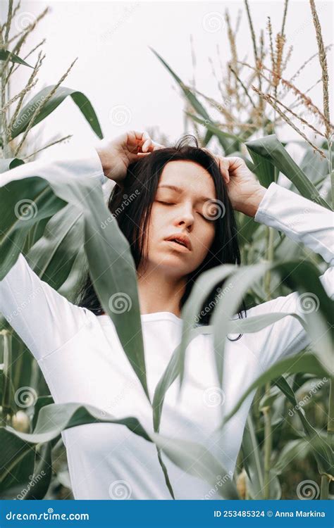 A Brunette Girl In A White Dress In A Cornfield The Concept Of