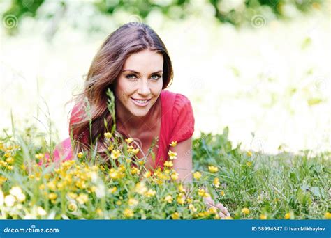 Young Woman In Red Dress Lying On Grass Stock Image Image Of