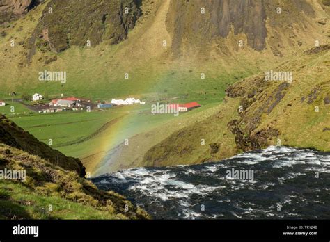 Rainbow over the Skogafoss waterfall in Iceland Stock Photo - Alamy