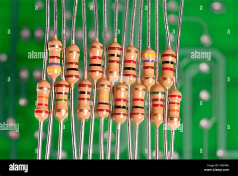 Many resistors on a circuit board with color code Stock Photo - Alamy