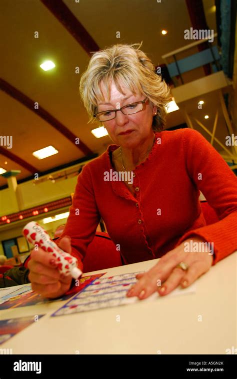 Elderly Woman Playing Bingo In Fulham West London Uk Stock Photo Alamy