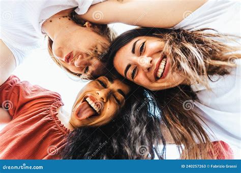 Best Friends Take A Selfie From Below With Smartphone On Vacation