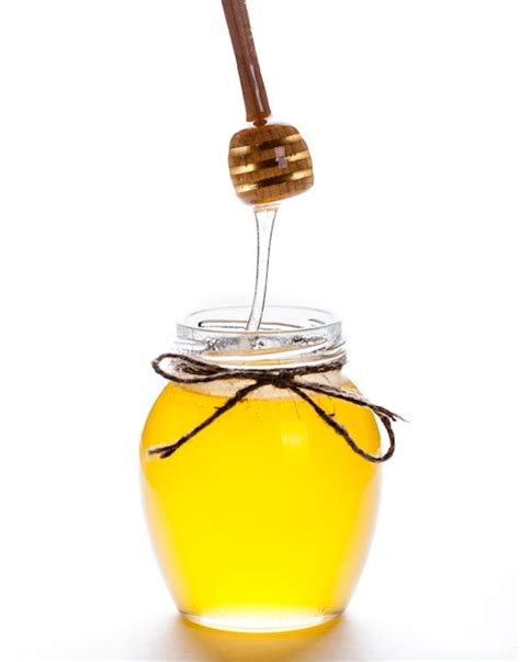 Premium Photo Full Honey Pot Honey Stick