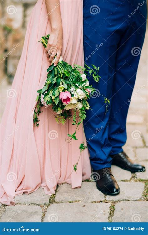 Wedding Roses and Peonies in the Hands of the Bride. Wedding in Stock ...