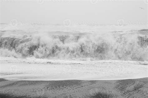 Large waves on black beach monochrome landscape photo 16563379 Stock Photo at Vecteezy