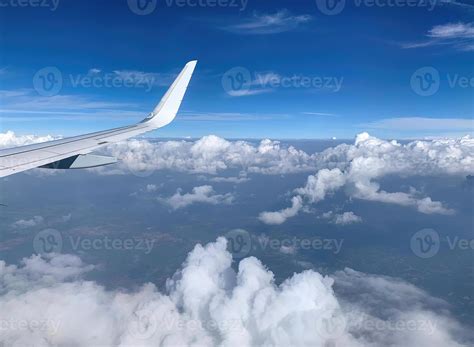 Airplane Window View on Clouds 7 10281276 Stock Photo at Vecteezy