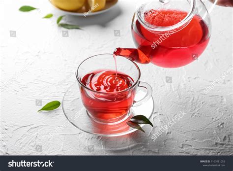 Pouring Hot Red Tea Into Glass Stock Photo 1107631055 Shutterstock