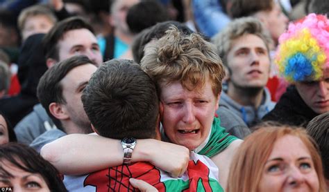 Wales Team Celebrate Historic Euro 2016 Victory Over Belgium By Leading