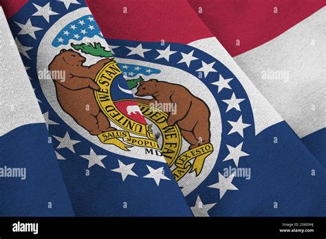 Missouri US state flag with big folds waving close up under the studio ...