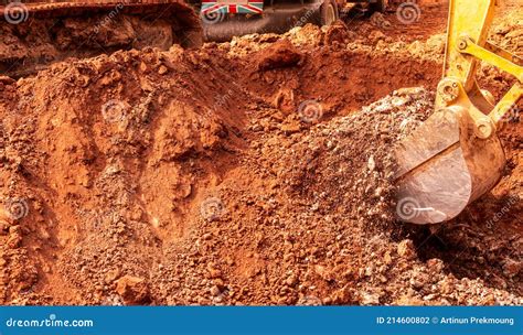 Backhoe Digging Soil At Construction Site Bucket Of Backhoe Digging