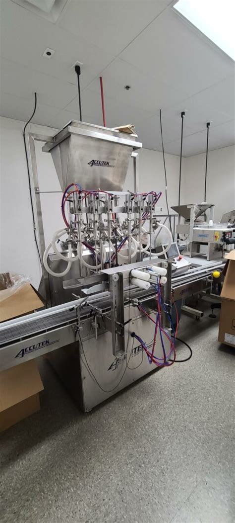 Accutek Head Volumetric Piston Filler With Conveyor