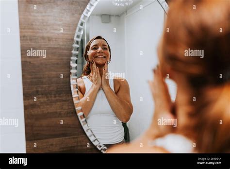Mature Woman Standing Front Mirror High Resolution Stock Photography And Images Alamy