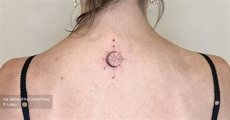 Compass Rose And Crescent Moon Tattoo Located On The