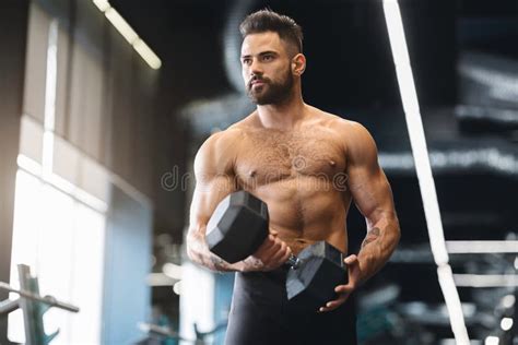 Two Men Exercising With Dumbbell At Gym Stock Photo Image Of Active