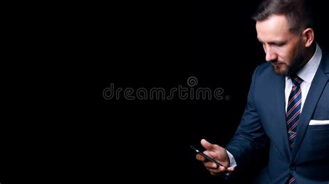 Young Man In Classic Suit With Tie On Black Background Businessman