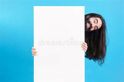 Playful Man Holding A Board With Blank Space Stock Image Image Of