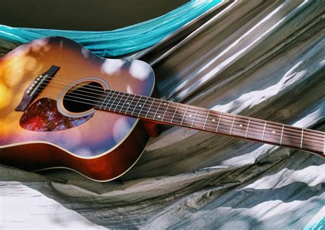 8 Awesome Tips That Will Help You Master Acoustic Guitar Roadie Music Blog