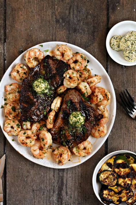 Grilled Steak And Shrimp Cooking With Curls
