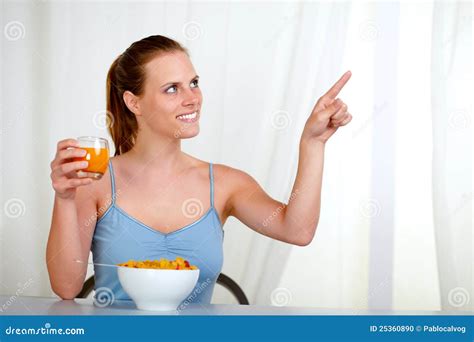 Pretty Lovely Woman Eating Meal And Pointing Stock Photo Image Of