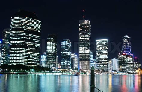 Stunning Brisbane skyline at night. City lights with river reflections | Stock image | Colourbox