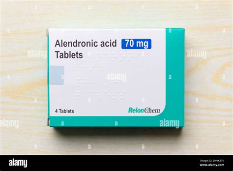 Relon Chem 70mg Alendronic Acid Bisphosphonate In Box Isolated On Wood