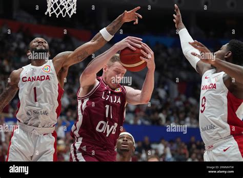 Latvia Forward Rolands Smits 11 Plays Against Canada Guard Nickeil