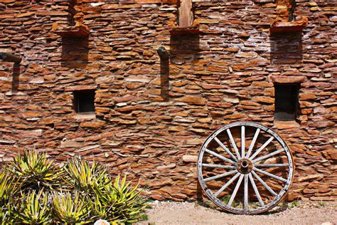 Old West Wagon Wheel Photograph by Gravityx Designs - Pixels