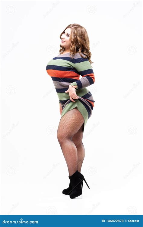 Plus Size Model In Colored Striped Dress Fat Woman On White Background Body Positive Concept