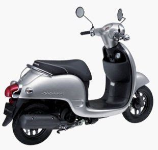 A Silver Scooter Is Shown On A White Background