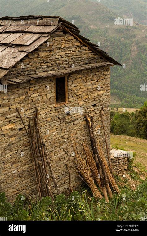 A Traditional Nepalese Farm Building Of Stone With A Slate Tile Roof In