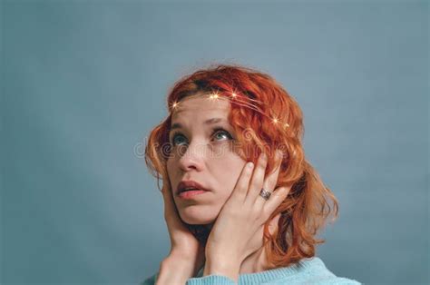 Beautiful Woman Looks To The Side Portrait With A Light Mouth Around