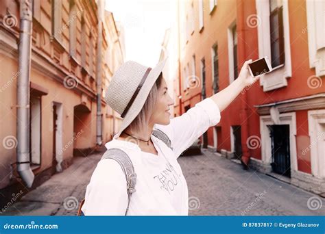 Happy Young Female Traveler Taking Selfie On Street Travel Concept