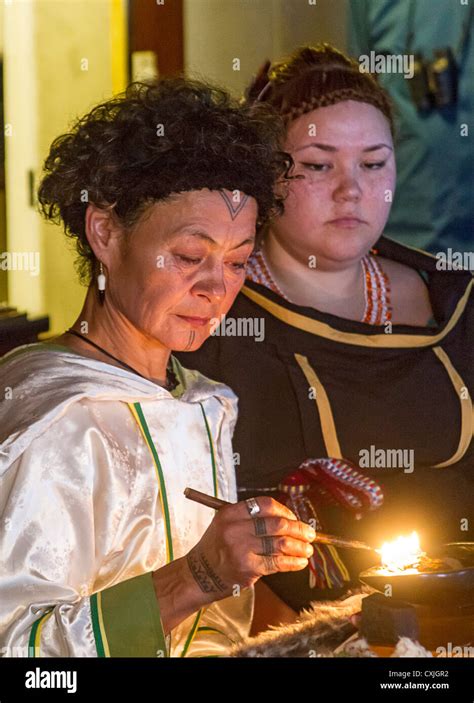 Inuit Women Light Oil Lamp To Greet Visitors To The High Arctic Stock