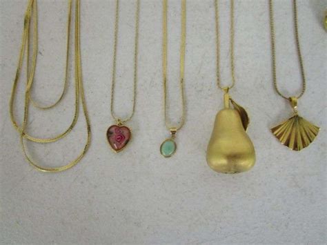 Assortment Of Monet Gold Tone Jewelry Oberman Auctions