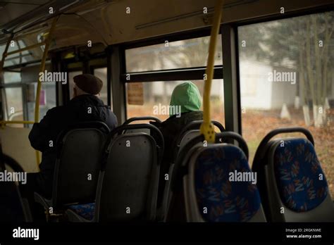 People On Bus Passengers Sit On Seats In Transport Inside Public