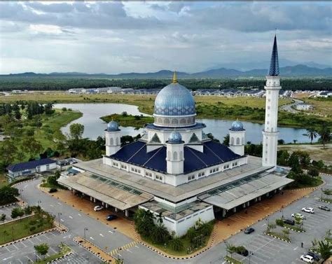 An Aerial View Of A Large Building With A Blue Dome