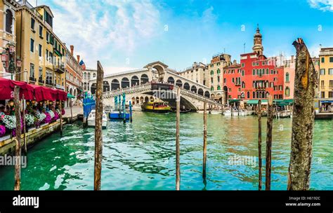 Panoramic View Of Famous Canal Grande With Famous Rialto Bridge In