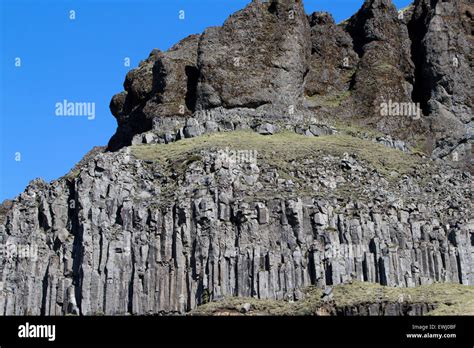 Hexagonal Basalt Volcanic Columns Rock Formations In Cliffs Near The