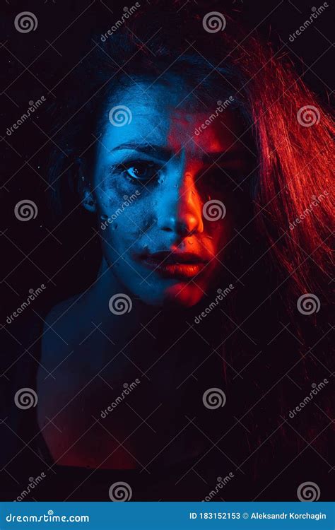 Sensual Portrait Of Sad Crying Girl Behind Glass With Raindrops Stock