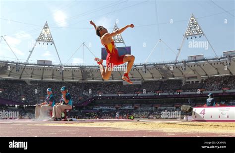 Spains Xavier Porras Sails Toward The Long Jump Pit In The Mens F11