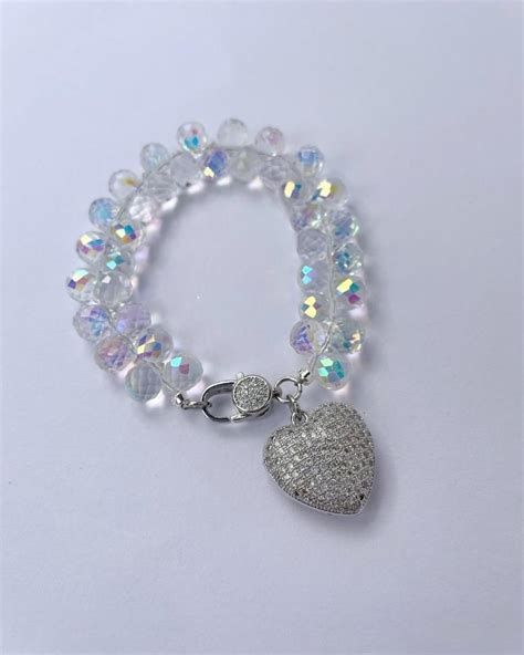 Pulsera Transparente Tornasol Con Coraz N Plateado Tabiz