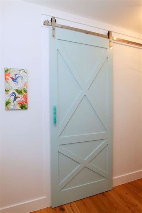 Barn Door Meets Beach House This Classic Barn Door Design Is Painted