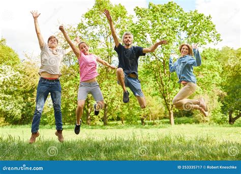 Active Group Of Friends Jumping In Nature Stock Image Image Of Happy